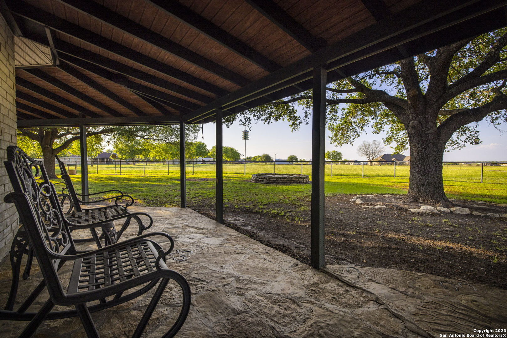 1940 Lower Seguin Road Marion, TX 78124 - Photo 10 of 49 a view of a swimming pool with chairs in patio