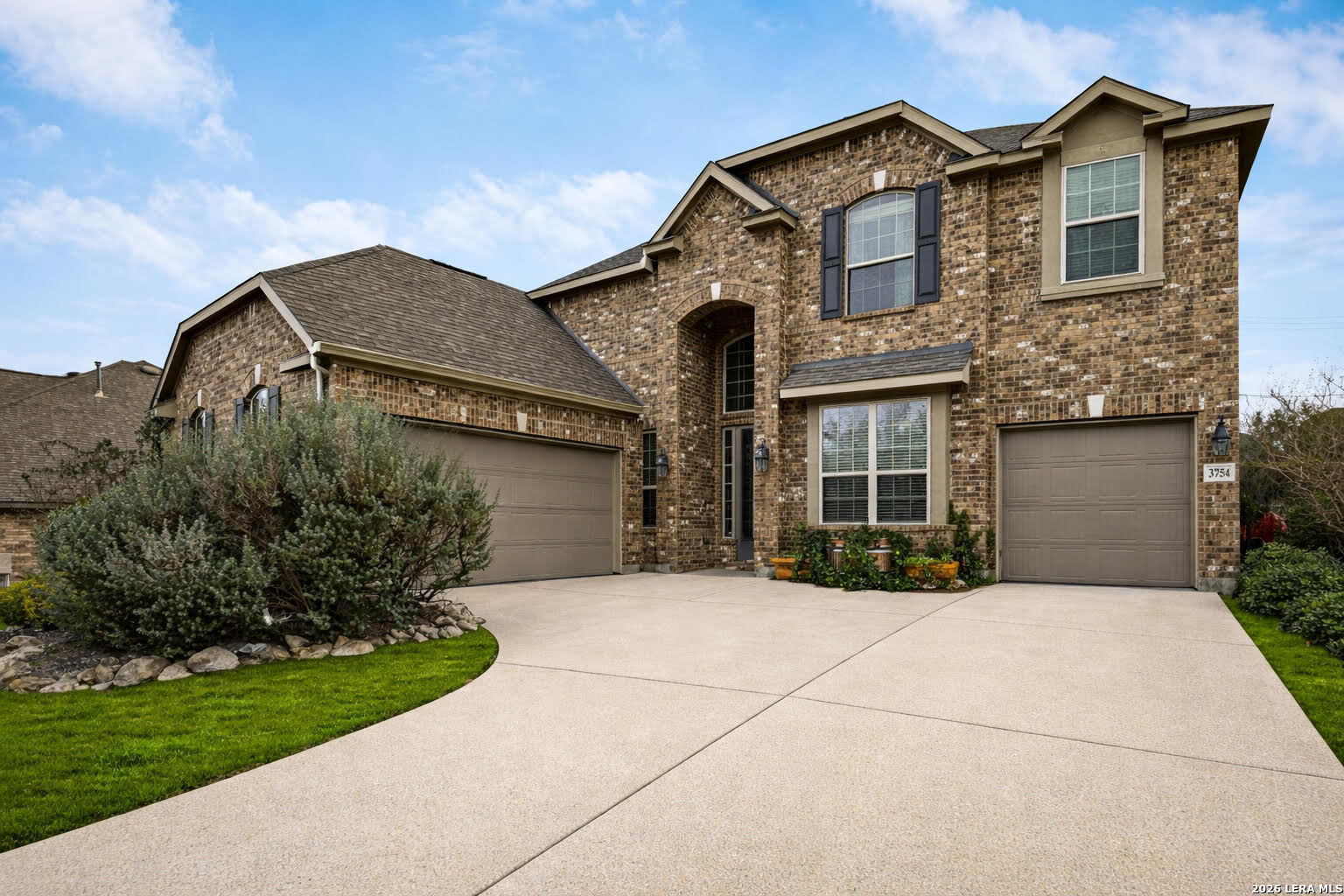 3754 Tumeric Cove Bulverde, TX 78163 - Photo 1 of 42 a front view of a house with garden