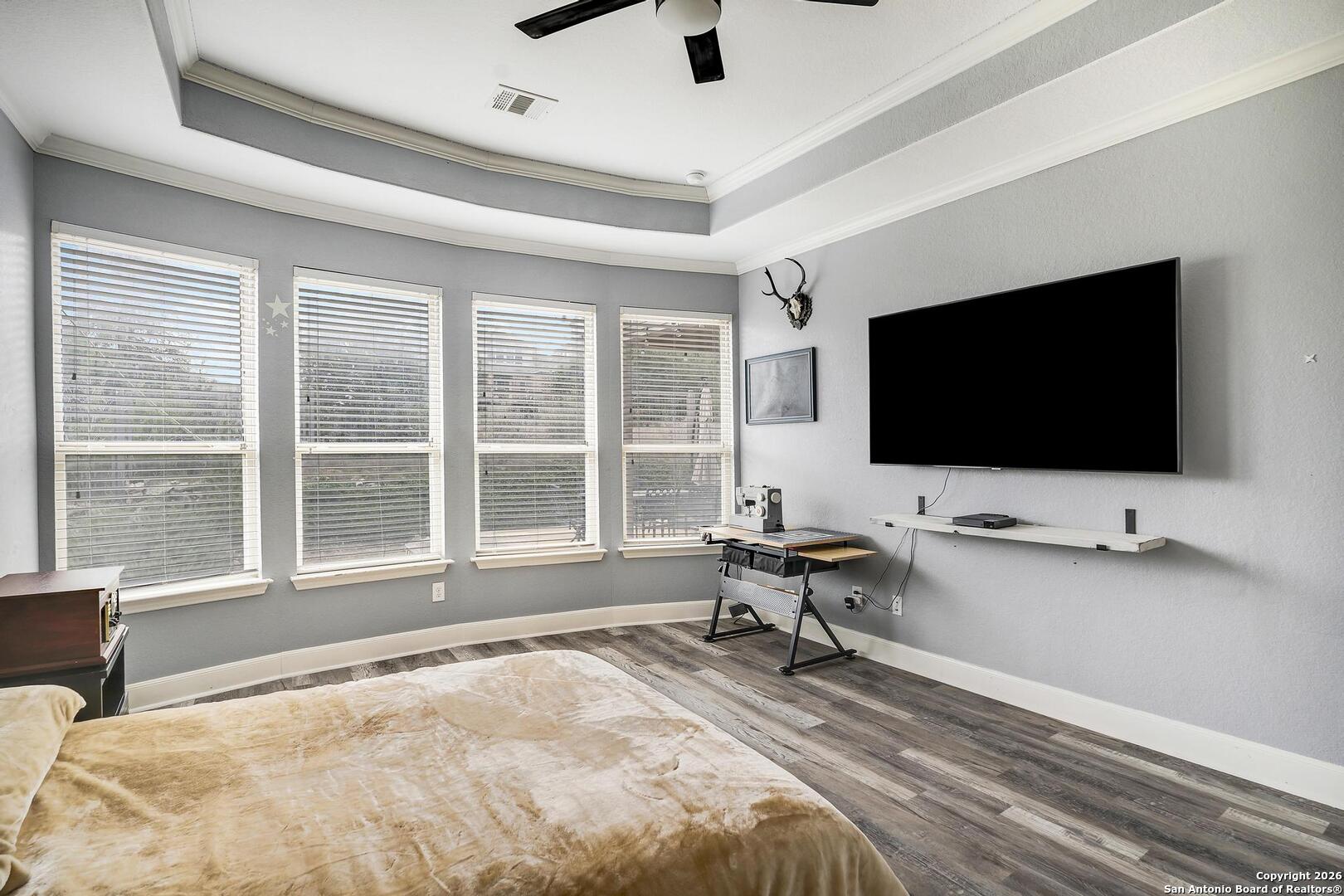 3754 Tumeric Cove Bulverde, TX 78163 - Photo 20 of 42 a living room with furniture and a flat screen tv