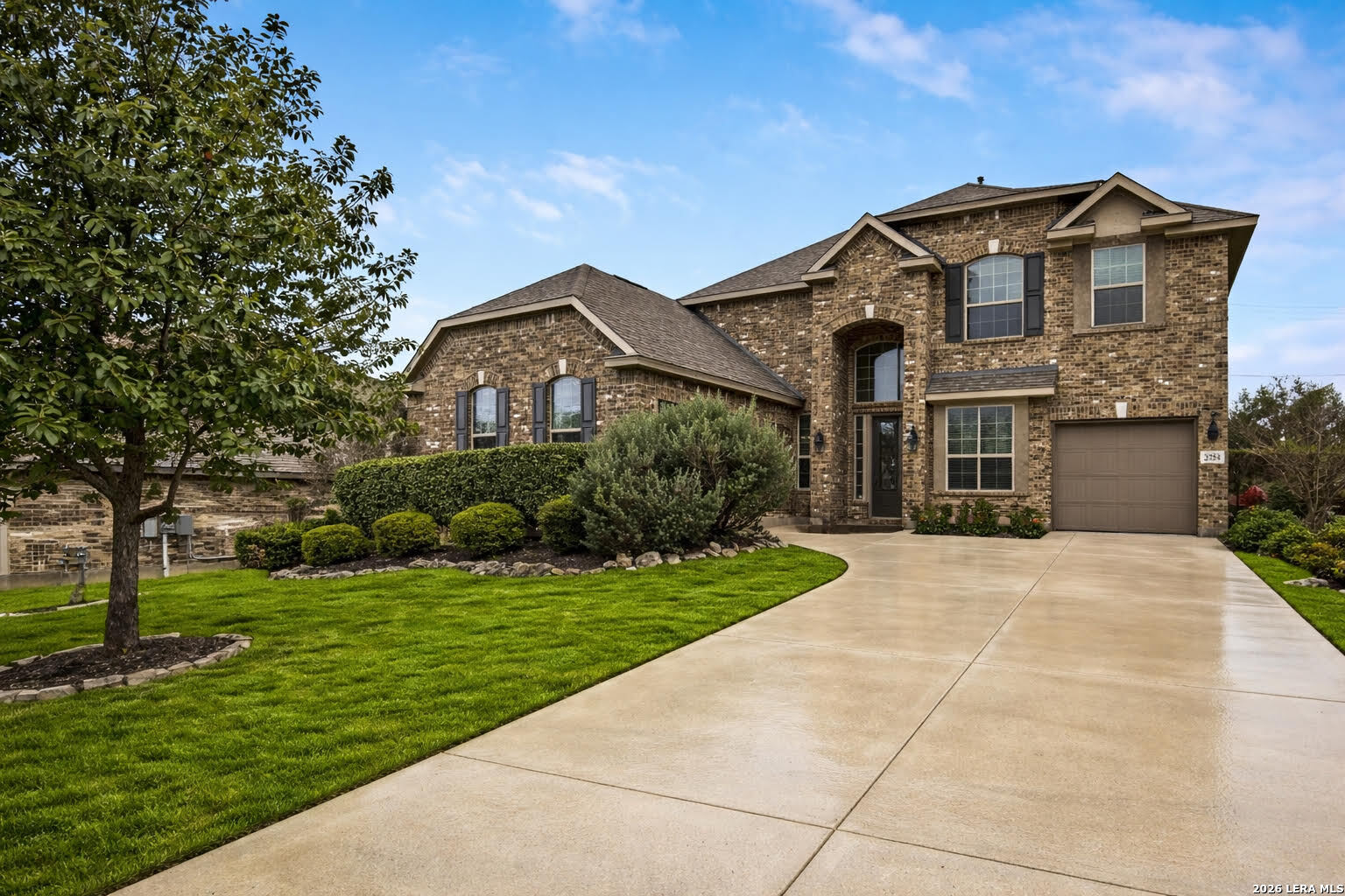 3754 Tumeric Cove Bulverde, TX 78163 - Photo 2 of 42 a front view of a house with a yard