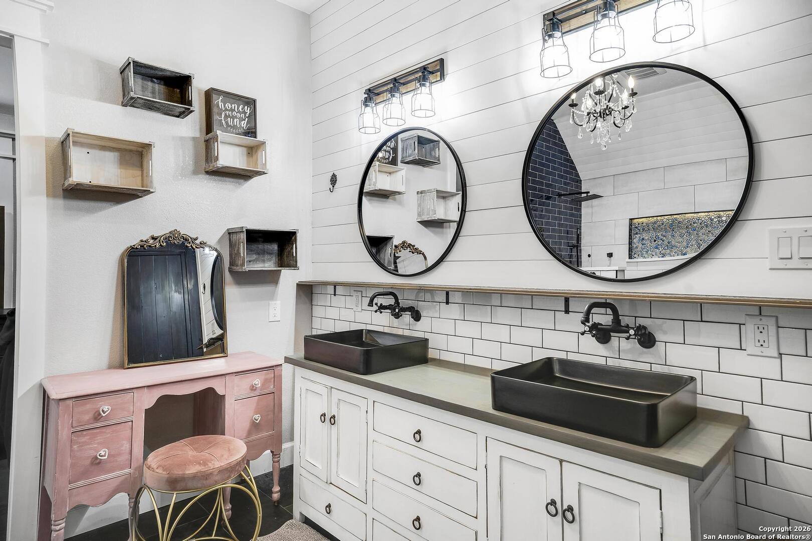 3754 Tumeric Cove Bulverde, TX 78163 - Photo 29 of 42 a bathroom with a toilet a sink and a mirror