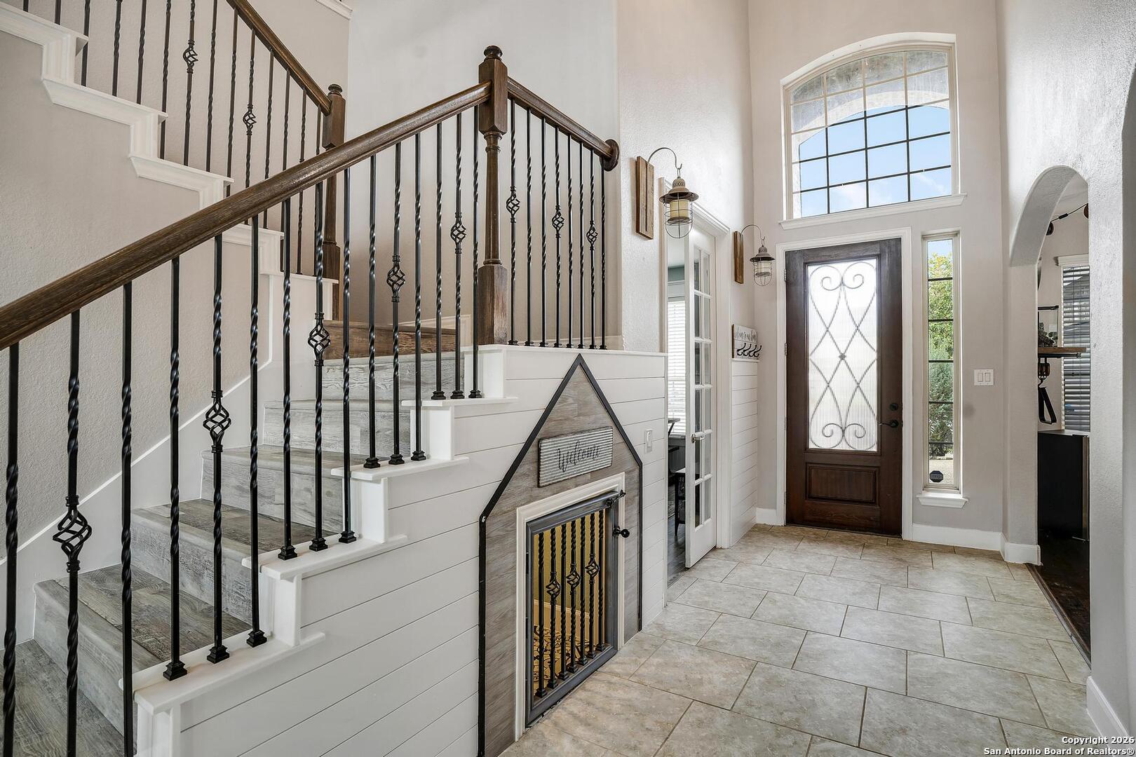 3754 Tumeric Cove Bulverde, TX 78163 - Photo 3 of 42 a view of an entryway with staircase
