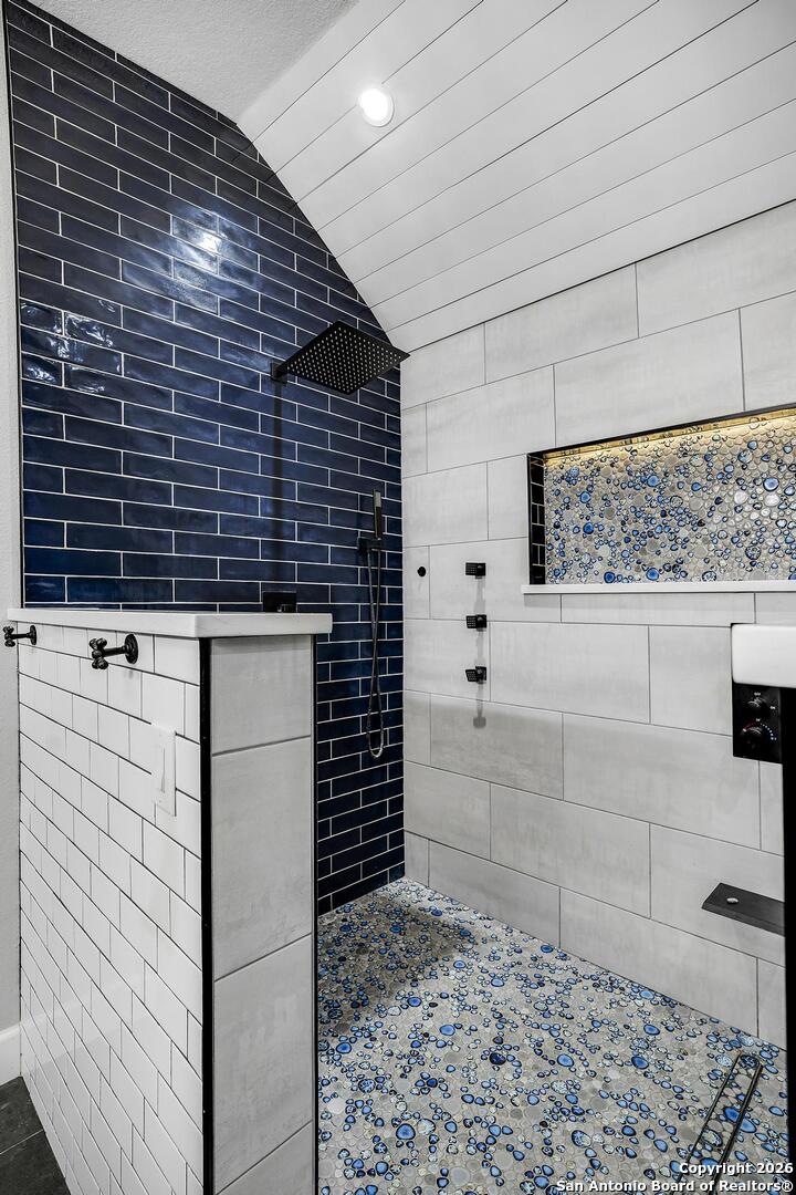3754 Tumeric Cove Bulverde, TX 78163 - Photo 31 of 42 a bathroom with a shower