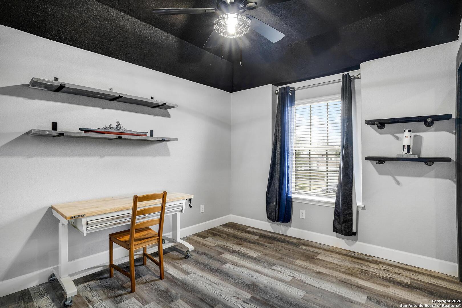 3754 Tumeric Cove Bulverde, TX 78163 - Photo 34 of 42 a view of a livingroom with furniture and a window