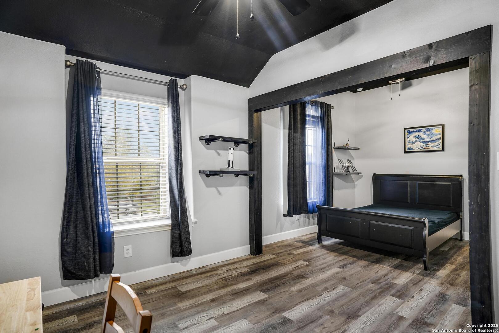 3754 Tumeric Cove Bulverde, TX 78163 - Photo 35 of 42 a living room with furniture and a window