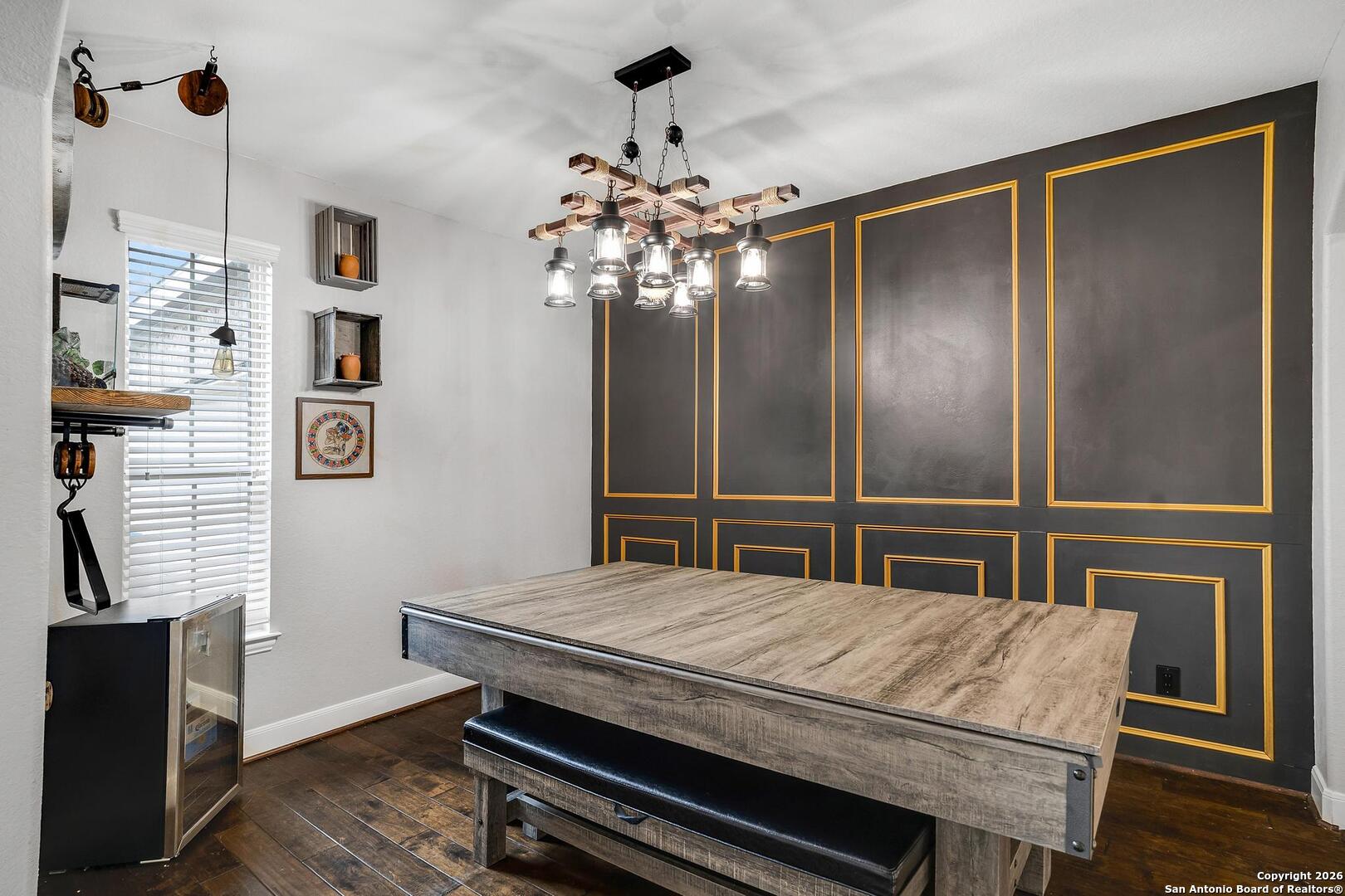 3754 Tumeric Cove Bulverde, TX 78163 - Photo 6 of 42 a room with a bed and a chandelier