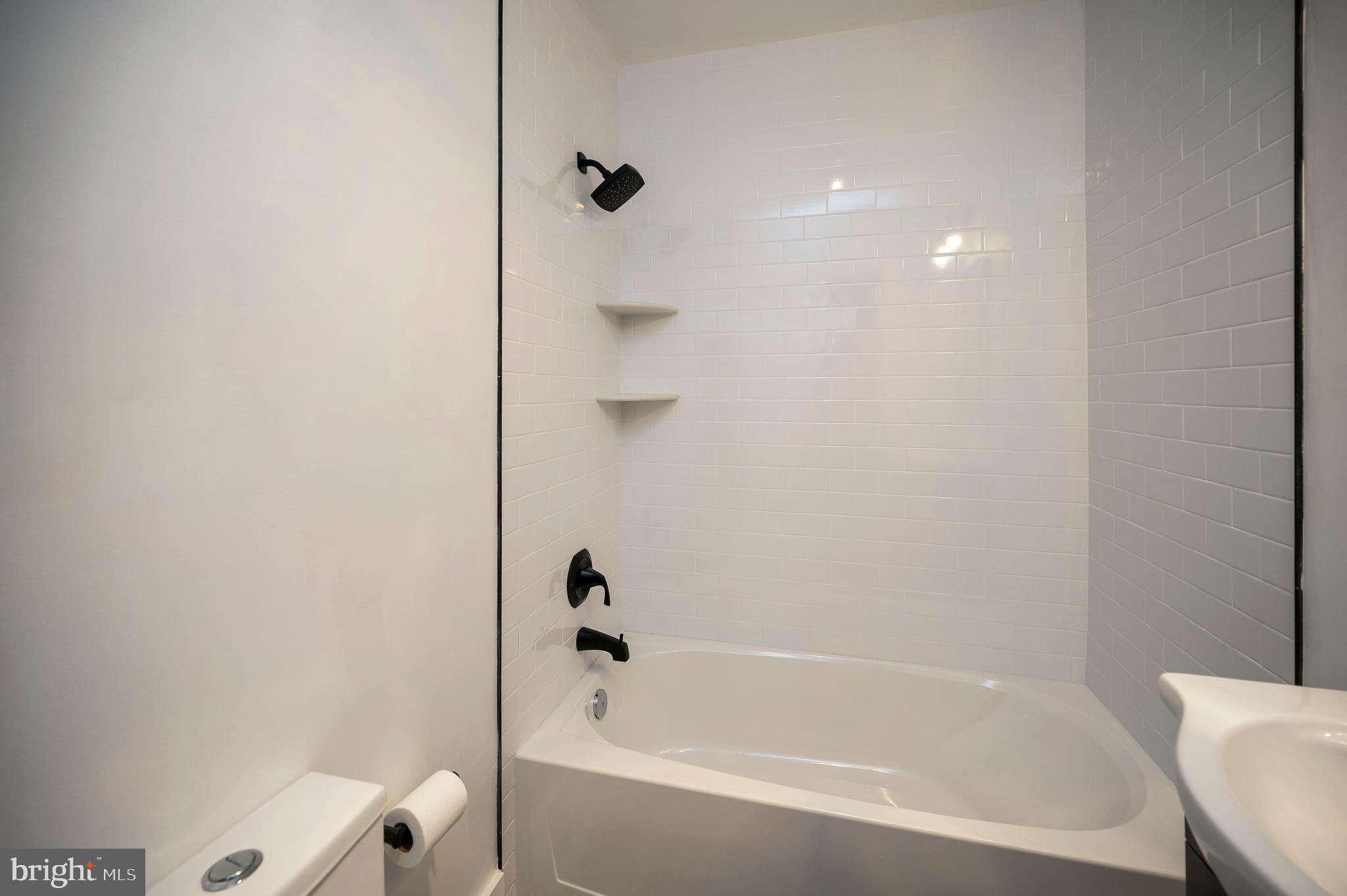 141 Onville Road Stafford, VA 22556 - Photo 19 of 44 a bathroom with a bathtub and shower