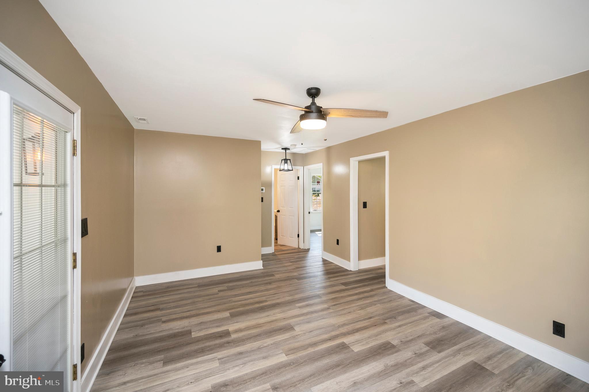 141 Onville Road Stafford, VA 22556 - Photo 20 of 44 a view of an empty room with wooden floor and a ceiling fan