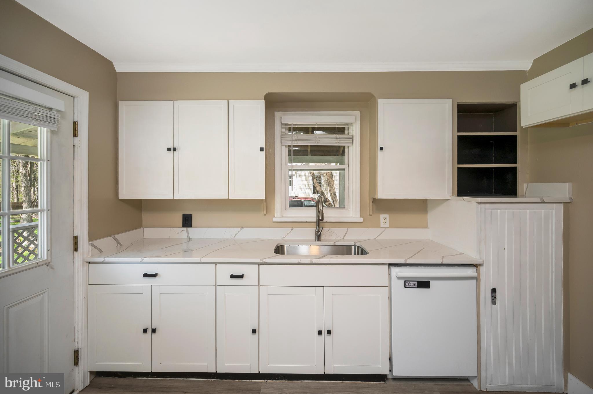 141 Onville Road Stafford, VA 22556 - Photo 2 of 44 a bathroom with a sink and a mirror