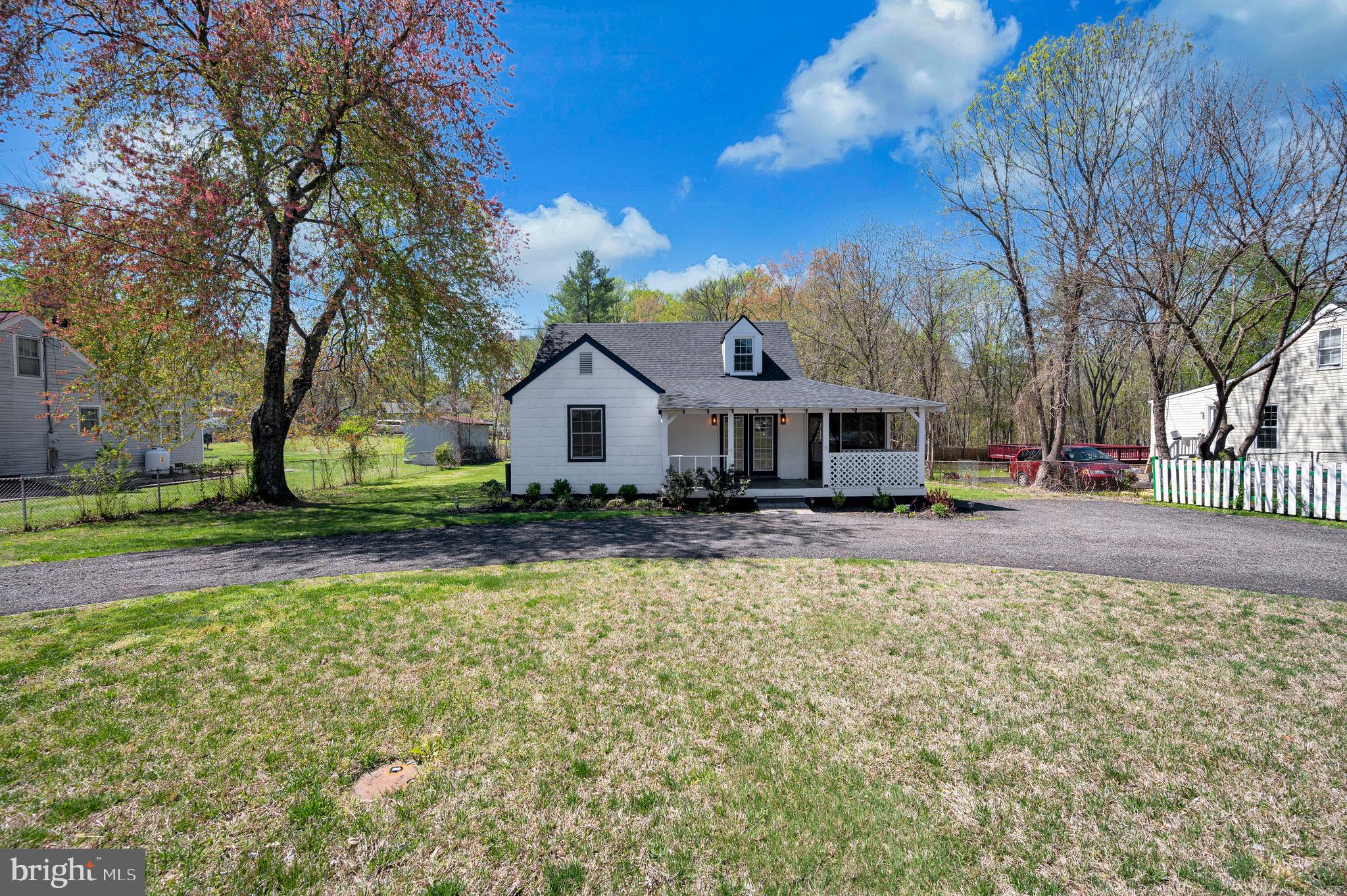 141 Onville Road Stafford, VA 22556 - Photo 22 of 44 a front view of a house with garden