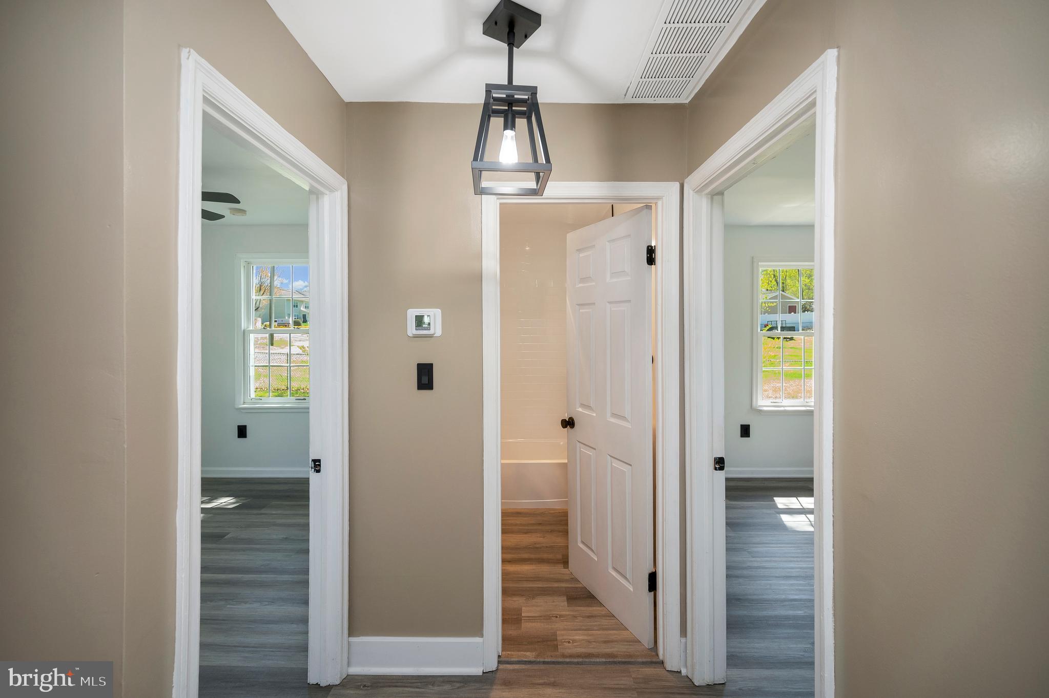 141 Onville Road Stafford, VA 22556 - Photo 24 of 44 a view of a hallway with wooden floor and closet area
