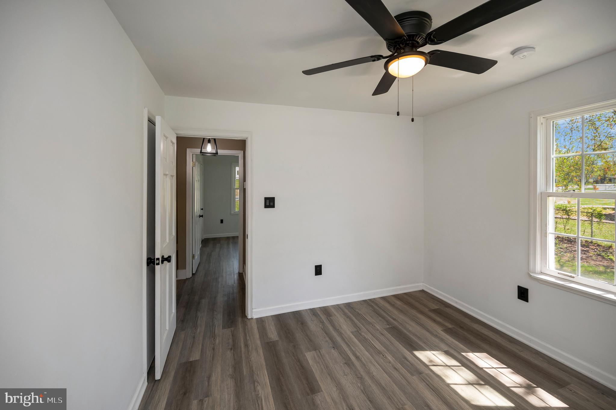 141 Onville Road Stafford, VA 22556 - Photo 29 of 44 wooden floor in an empty room with a window