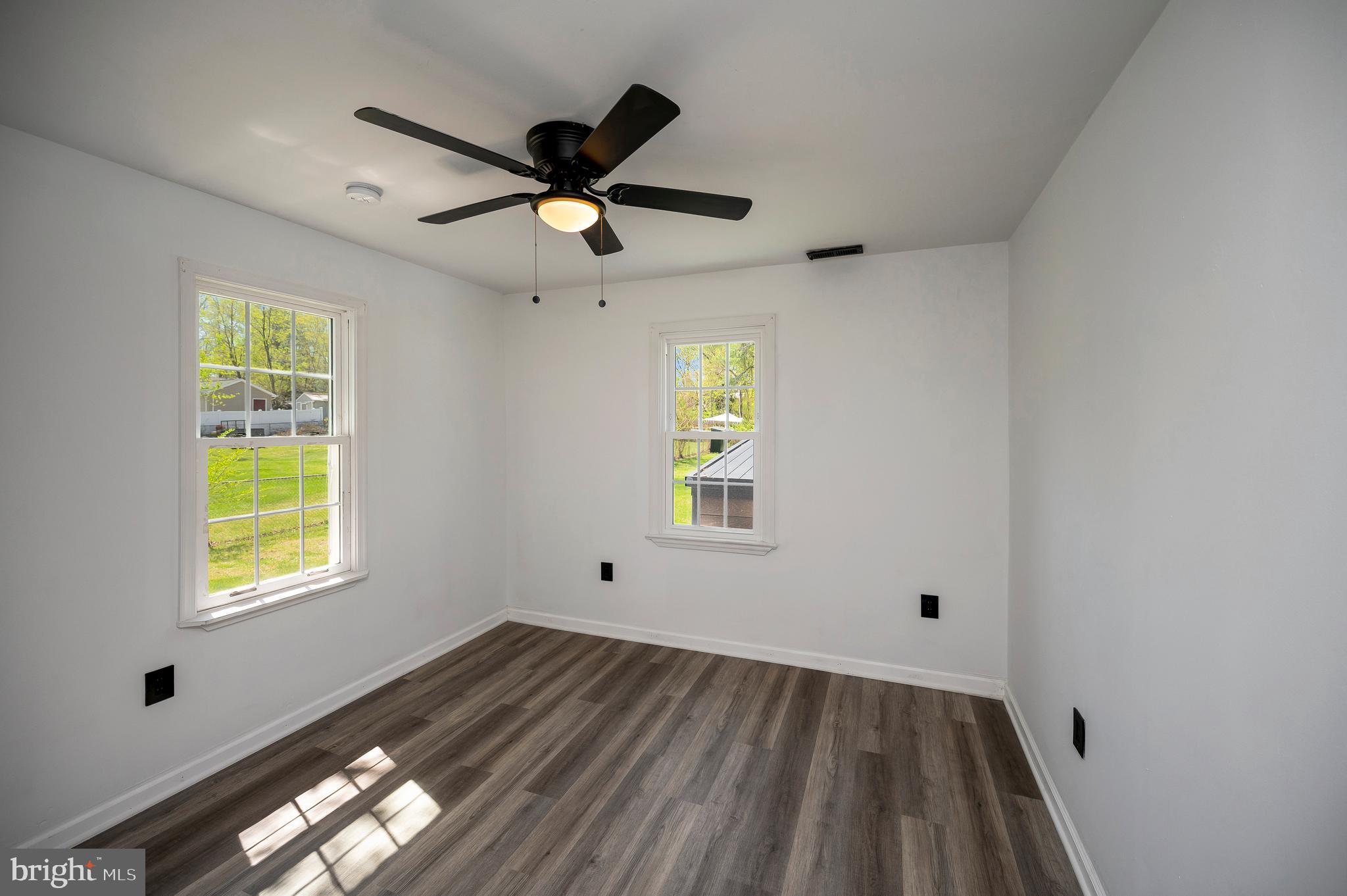 141 Onville Road Stafford, VA 22556 - Photo 35 of 44 a view of empty room with wooden floor and fan