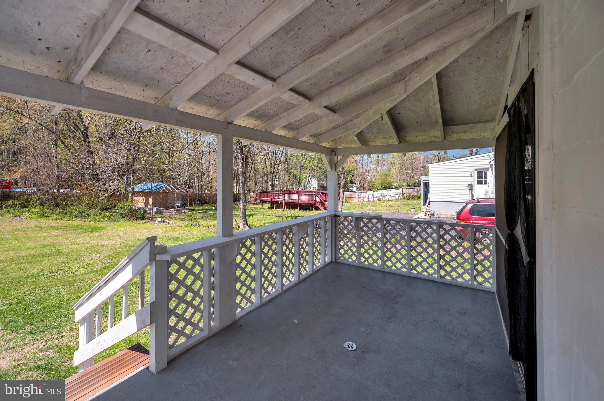 141 Onville Road Stafford, VA 22556 - Photo 41 of 44 a view of a porch with furniture and garden view