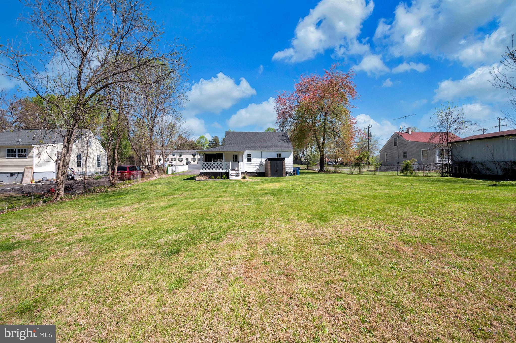 141 Onville Road Stafford, VA 22556 - Photo 43 of 44 a view of a house with a big yard and large trees