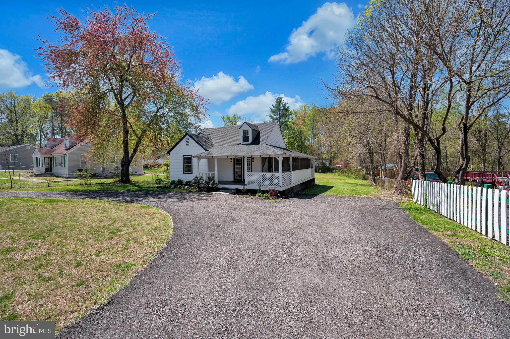 141 Onville Road Stafford, VA 22556 - Photo 5 of 44 a front view of a house with a yard and pathway