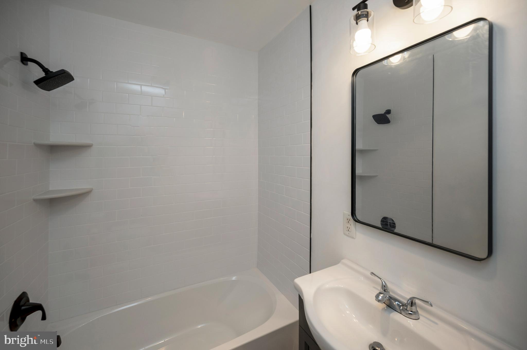141 Onville Road Stafford, VA 22556 - Photo 8 of 44 a bathroom with a sink and a mirror