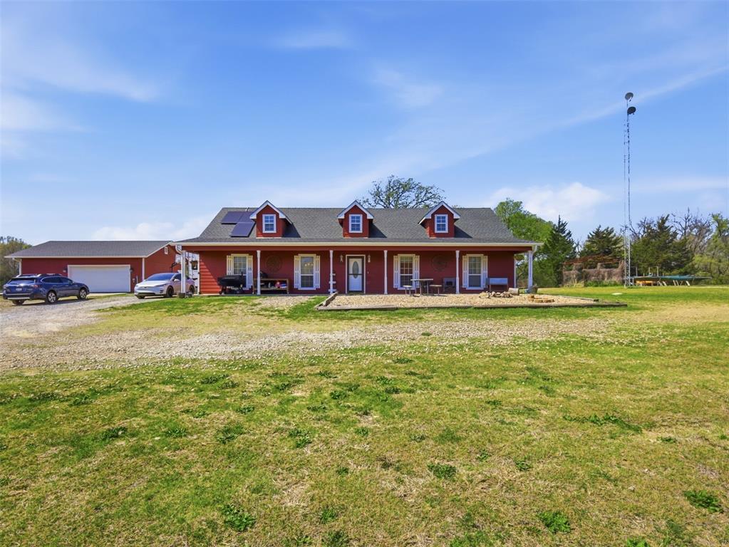 3823 State Highway Bonham, TX 75418 - Photo 3 of 37 a front view of house with yard barbeque and outdoor seating