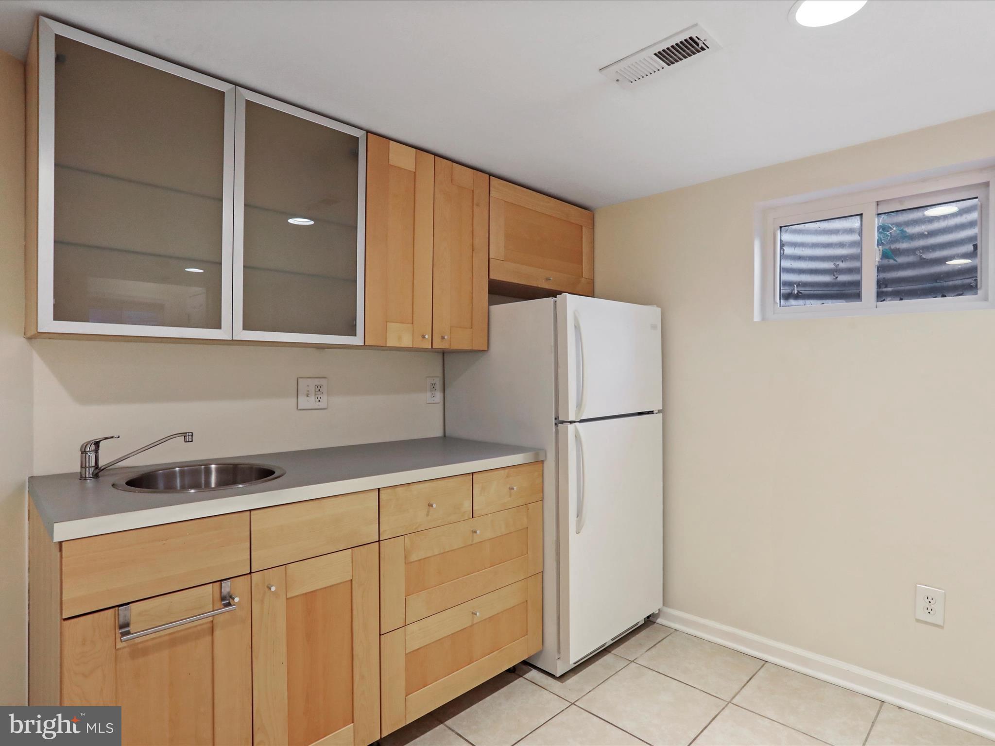 808 Malcolm Drive Silver Spring, MD 20901 - Photo 31 of 48 Built-in cabinets w/refrigerator