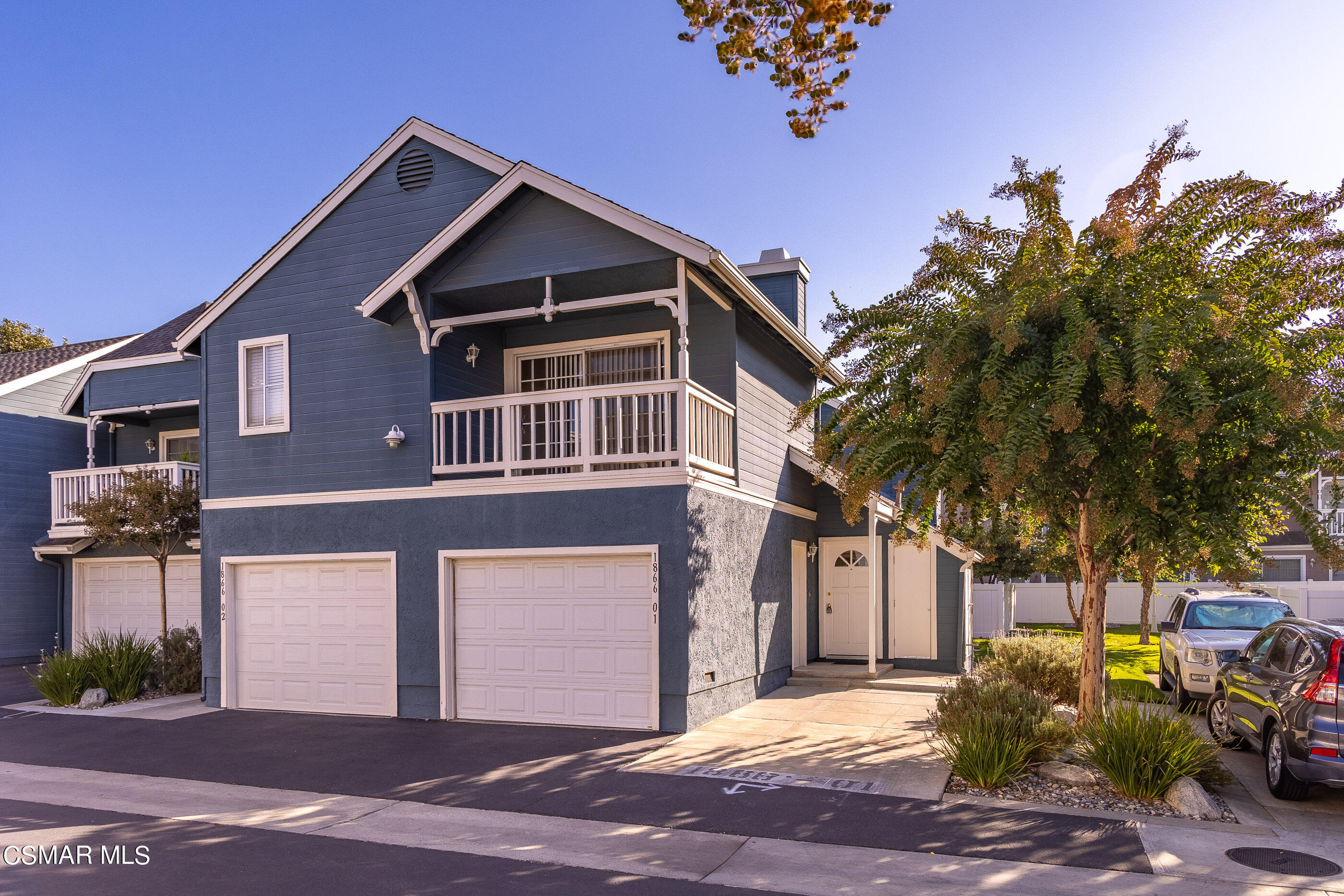 1866 Rory Lane, Unit 1 Simi Valley, CA 93063 - Photo 1 of 25 a front view of a house with a yard