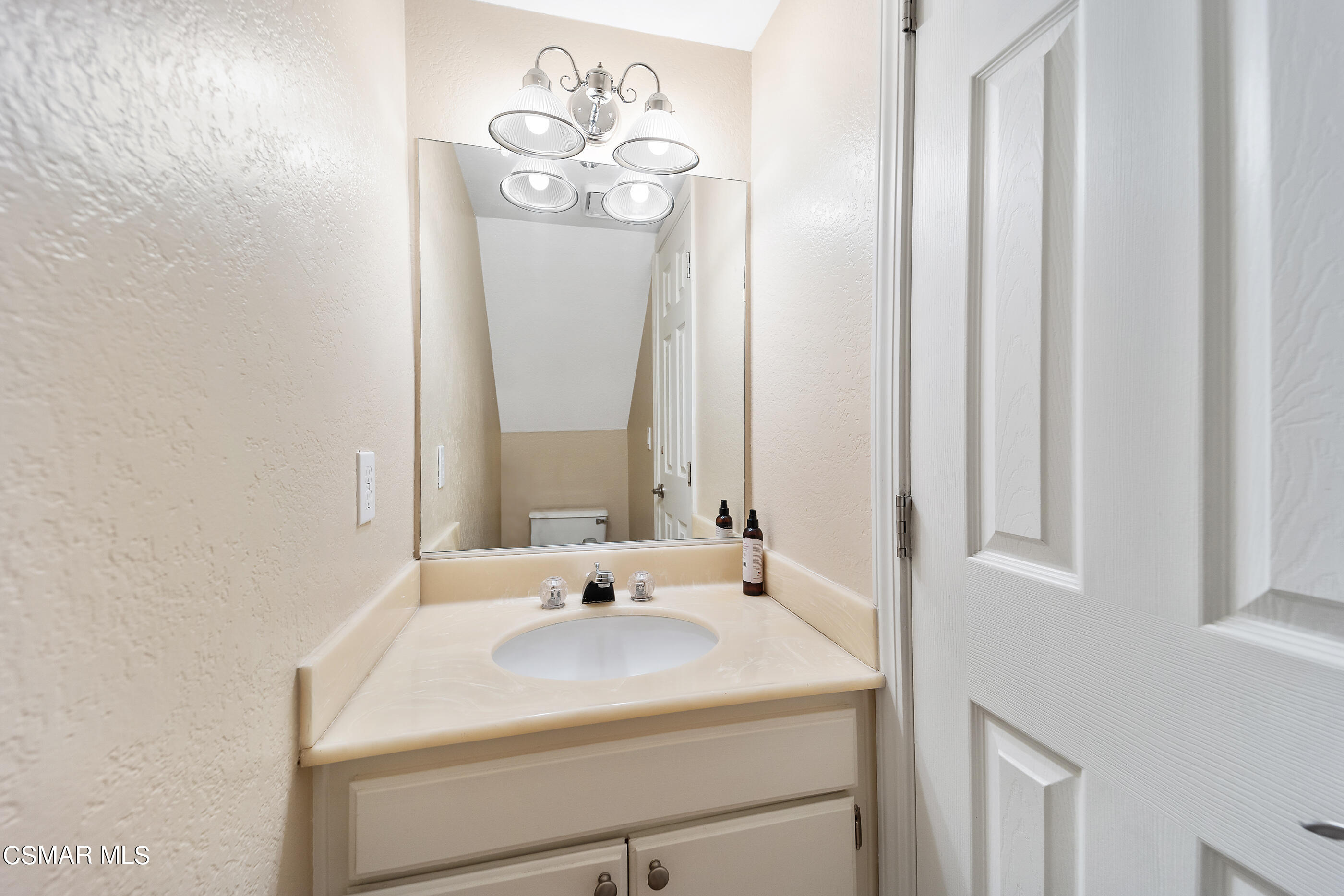 1866 Rory Lane, Unit 1 Simi Valley, CA 93063 - Photo 12 of 25 a bathroom with a sink and a mirror