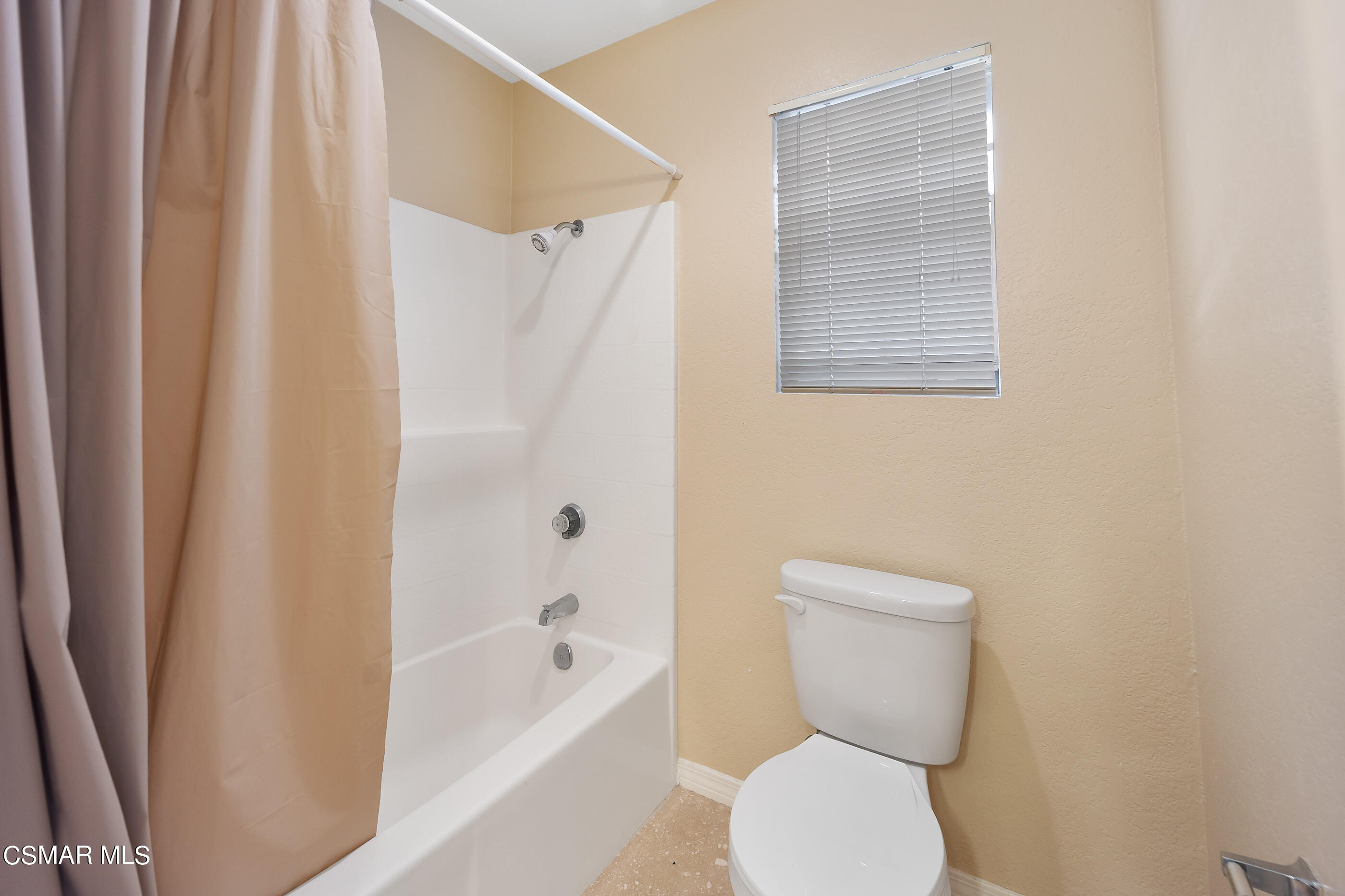 1866 Rory Lane, Unit 1 Simi Valley, CA 93063 - Photo 16 of 25 a bathroom with a toilet and a bathtub