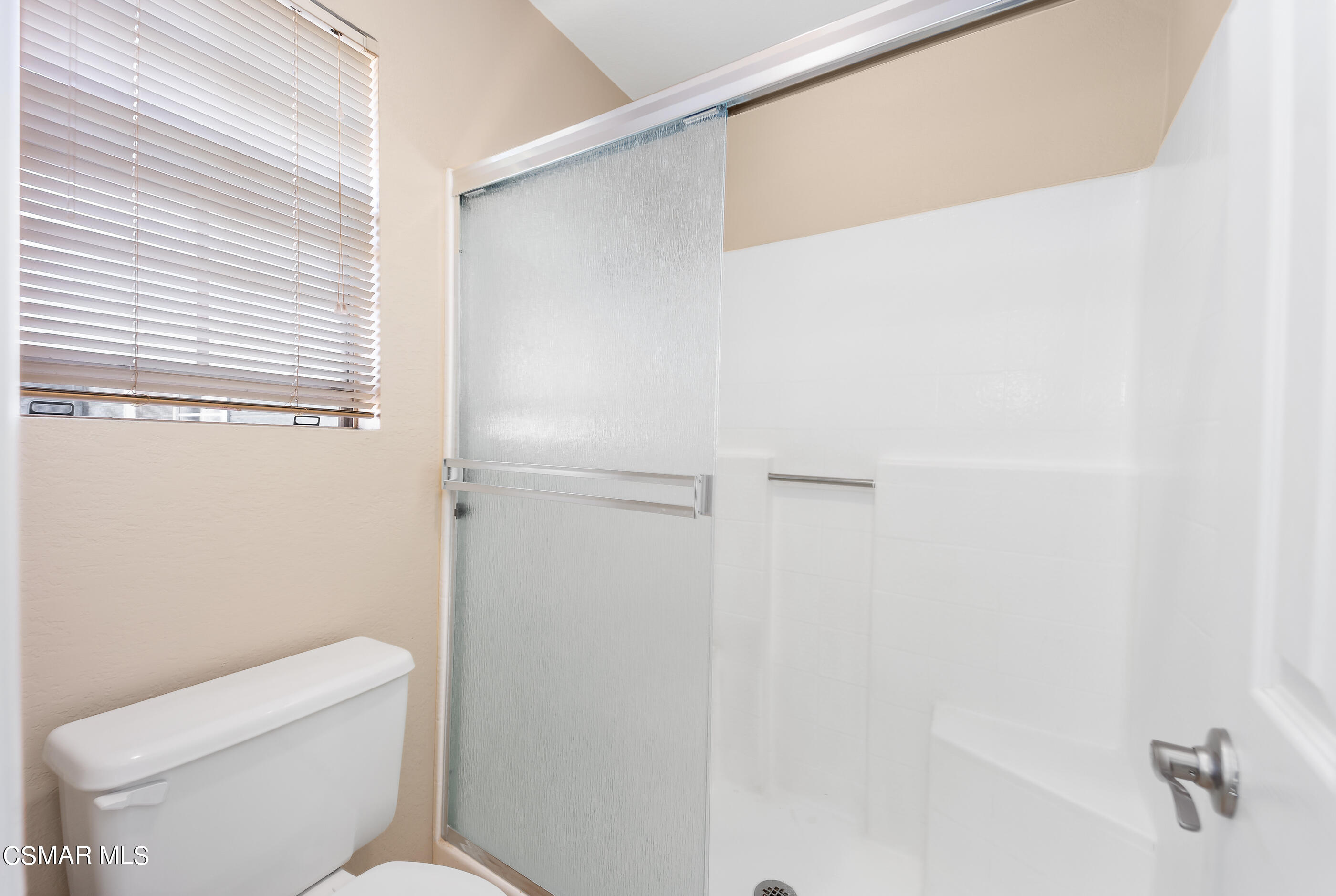 1866 Rory Lane, Unit 1 Simi Valley, CA 93063 - Photo 22 of 25 a white toilet sitting next to a shower