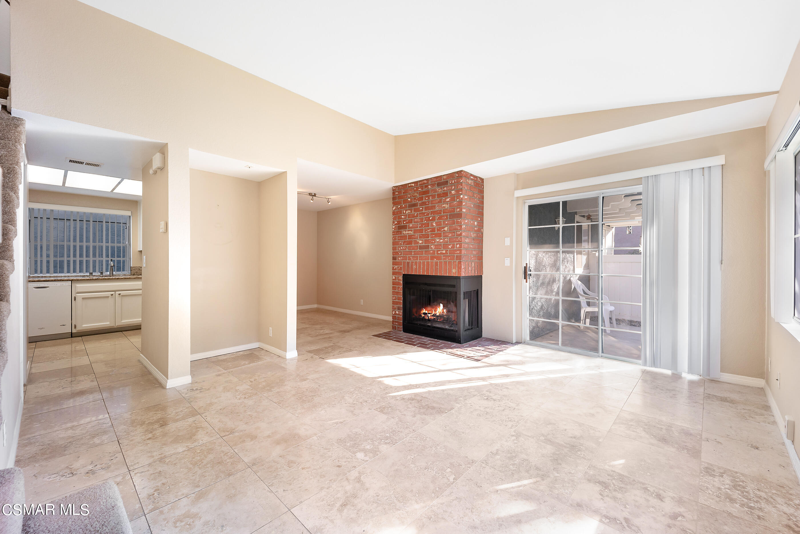 1866 Rory Lane, Unit 1 Simi Valley, CA 93063 - Photo 4 of 25 an empty room with furniture and a fireplace