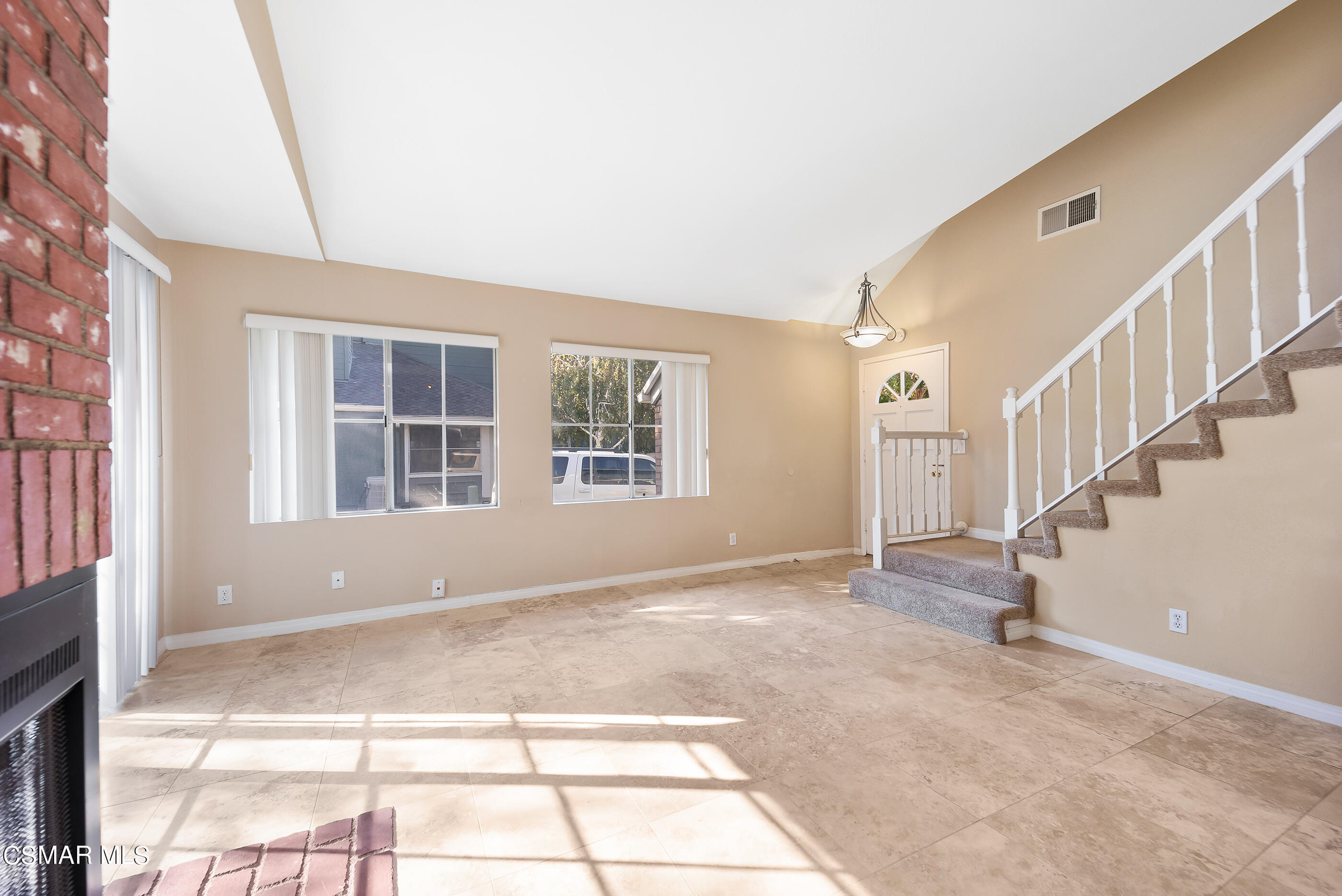 1866 Rory Lane, Unit 1 Simi Valley, CA 93063 - Photo 6 of 25 a view of an empty room with staircase and windows