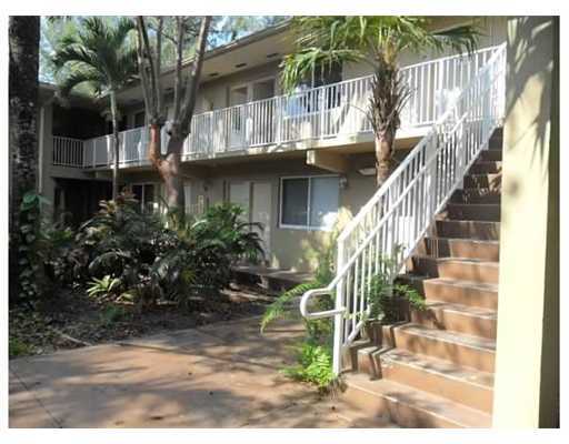 6330 Southwest 79th Street, Unit 23 South Miami, FL 33143 - Photo 1 of 7 a view of outdoor space and yard