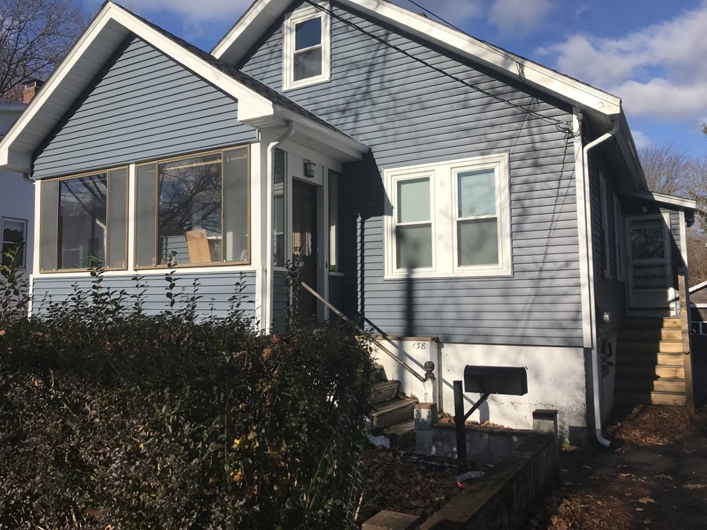 138 Sherman Street Quincy, MA 02170 - Photo 1 of 2 a view of a house with backyard and sitting area