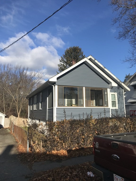 138 Sherman Street Quincy, MA 02170 - Photo 2 of 2 a front view of a house with yard