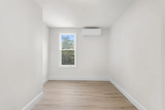 an empty room with a window