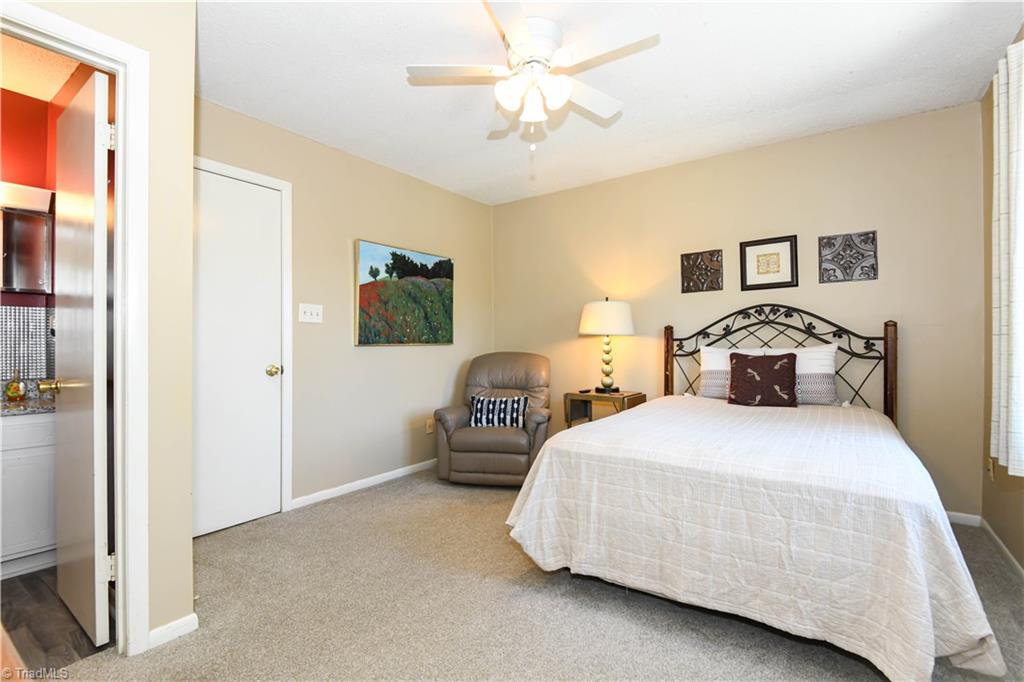 5735 Bramblegate Road, Unit E Greensboro, NC 27409 - Photo 18 of 25 Primary bedroom