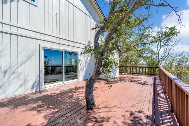 a house with trees in front of it