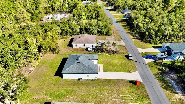 swimming pool with trees in the background