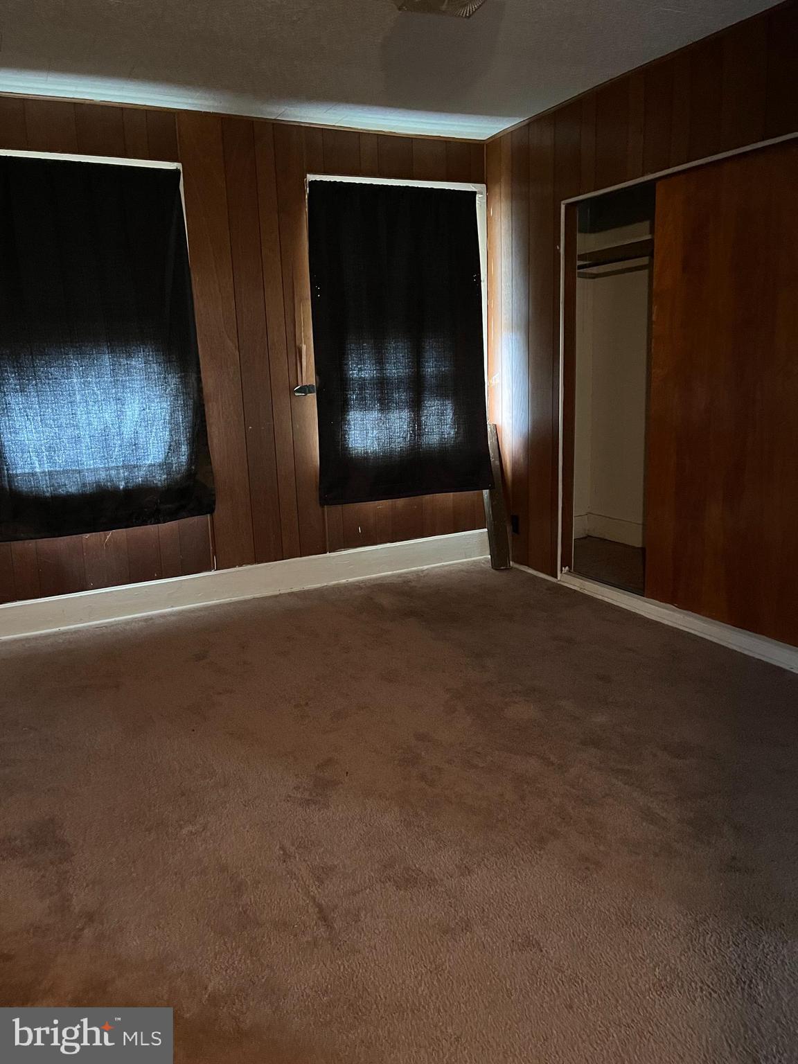 13 South Front Street Mifflintown, PA 17059 - Photo 12 of 30 a view of empty room with window and fireplace