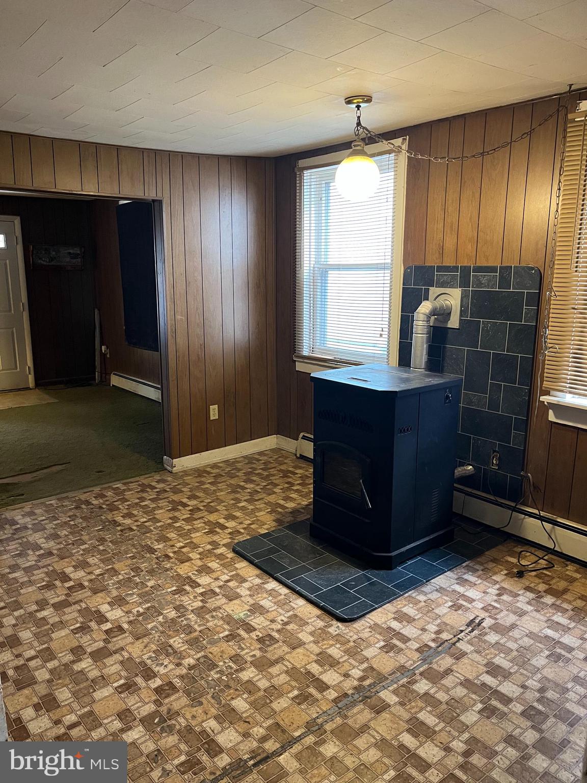 13 South Front Street Mifflintown, PA 17059 - Photo 13 of 30 a room with a large window and wooden walls