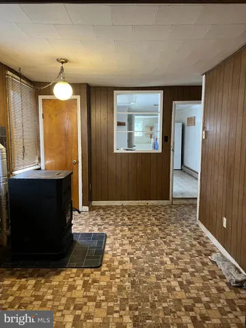 a kitchen with stainless steel appliances a sink stove and cabinets
