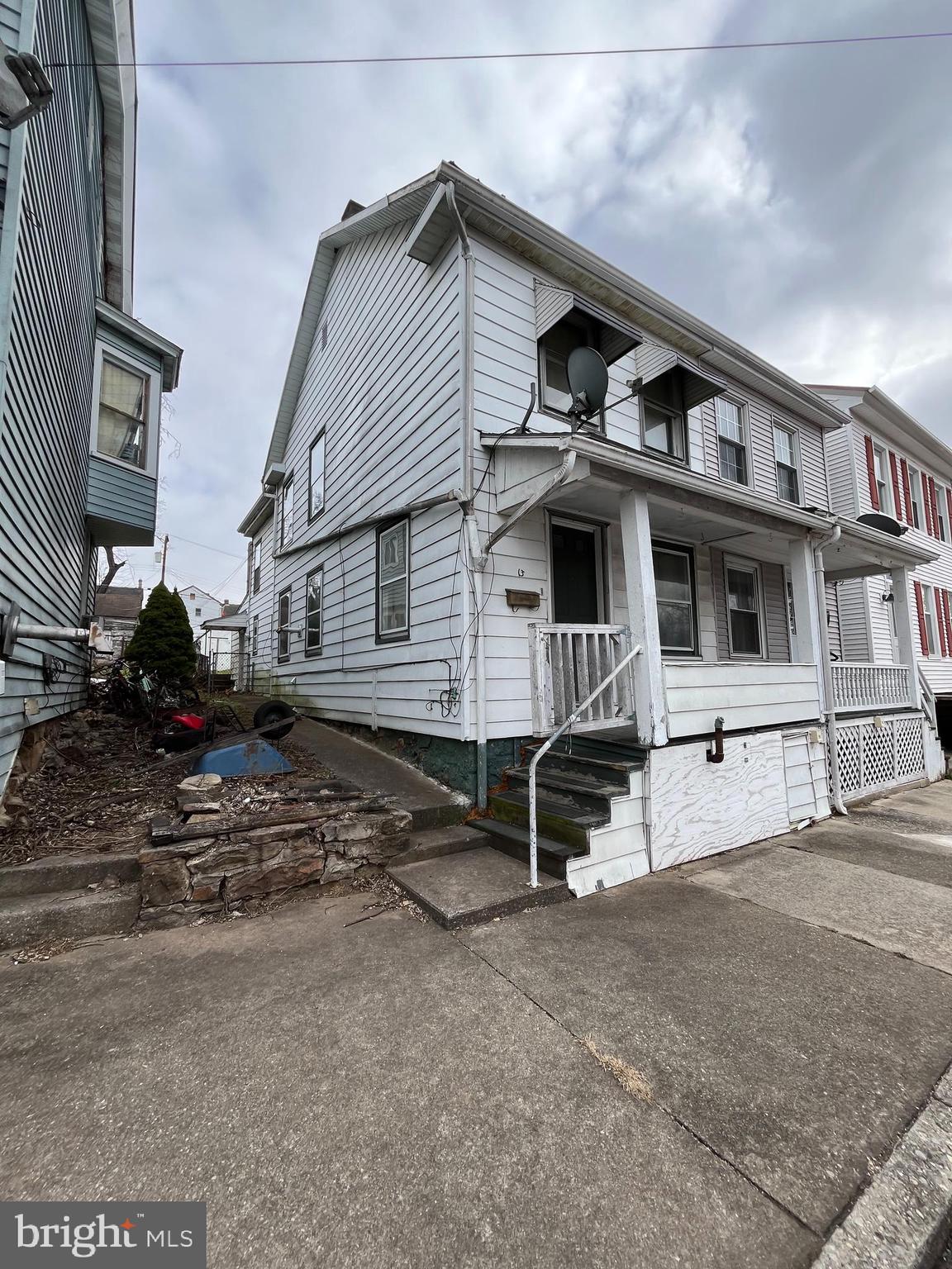 13 South Front Street Mifflintown, PA 17059 - Photo 4 of 30 a front view of a house with a garage