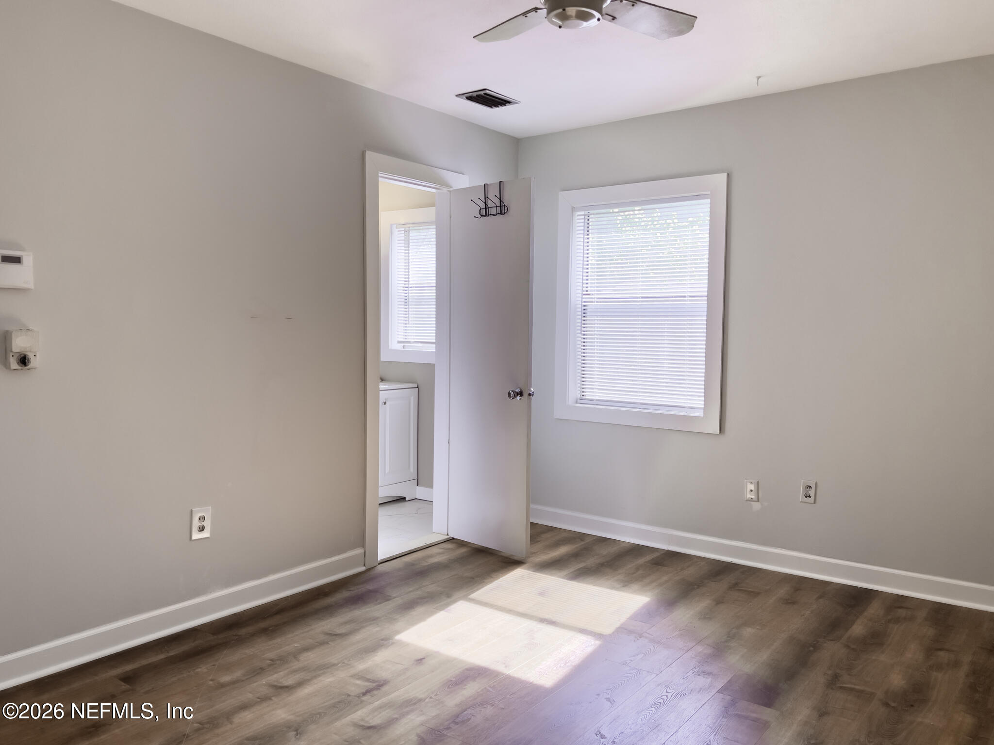 2085 Mills Road Jacksonville, FL 32216 - Photo 8 of 13 a view of an empty room and window