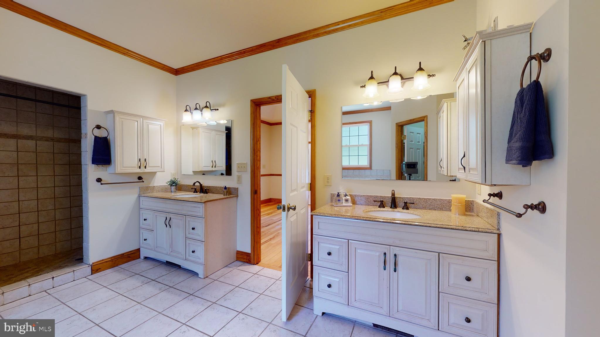 1096 CCC Road Linden, VA 22642 - Photo 9 of 45 Separate vanities in the owner's bath