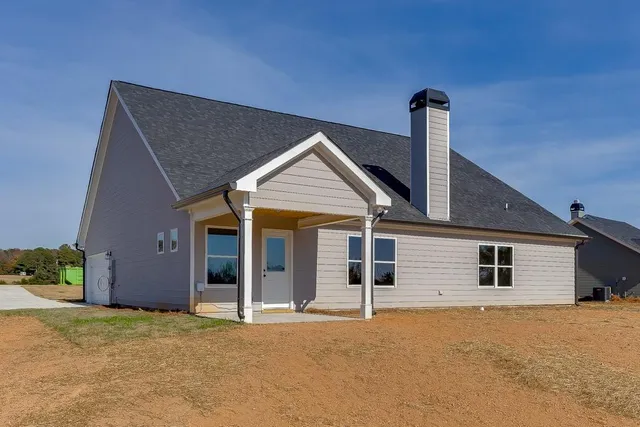 a front view of a house with a garage
