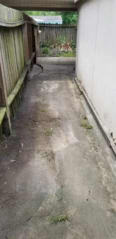 a view of a back yard of the house