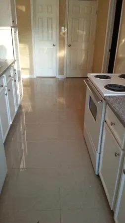 a view of a kitchen with a sink