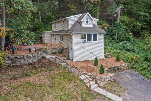 a view of a yard in front of a house