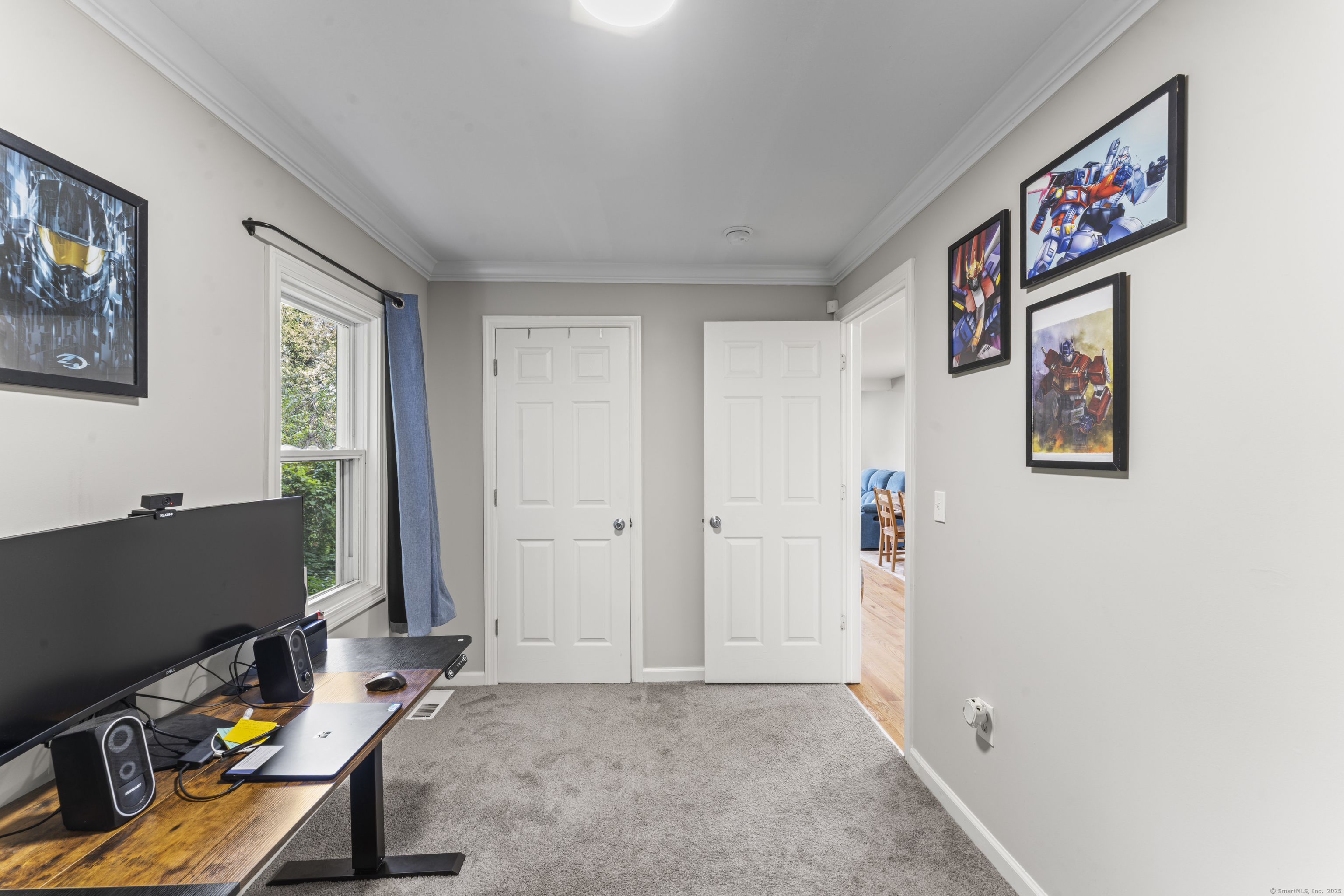 199 Riverside Road Newtown, CT 06482 - Photo 16 of 28 a view of a workspace with furniture and a window