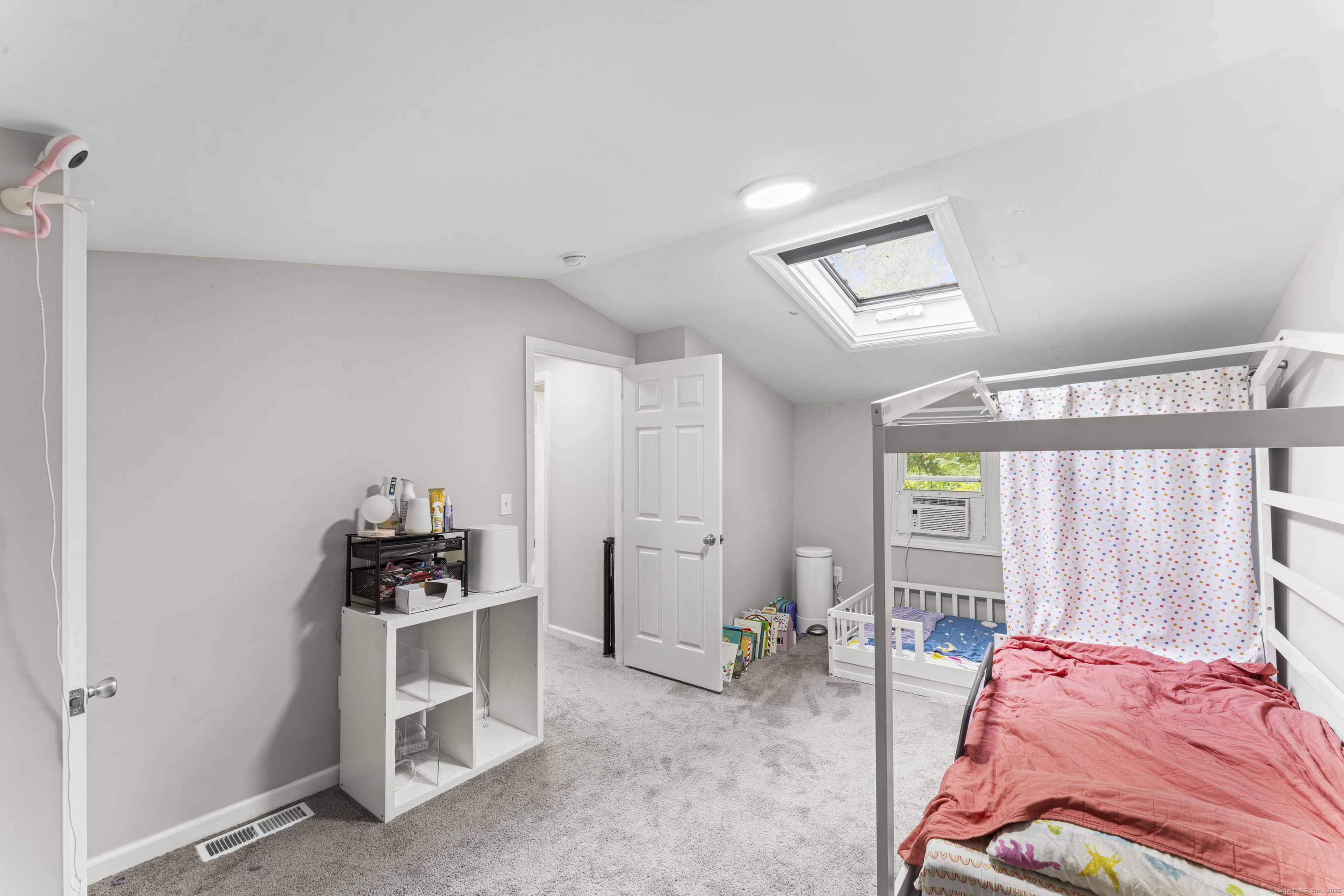 199 Riverside Road Newtown, CT 06482 - Photo 23 of 28 a bedroom with furniture and a window