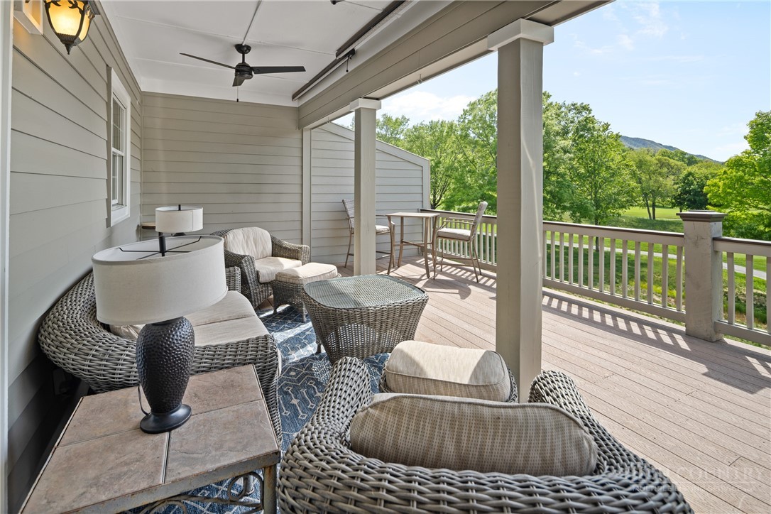 147 Riverside Park Court, Unit G2 Jefferson, NC 28640 - Photo 7 of 44 a balcony view with a couch