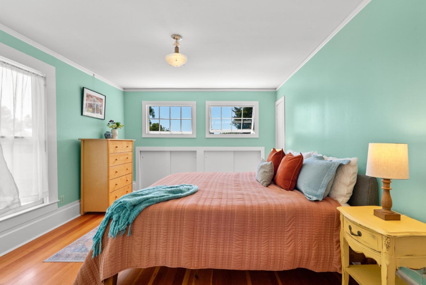 505 Cayuga Street Santa Cruz, CA 95062 - Photo 23 of 57 a bedroom with a bed and painting on the wall